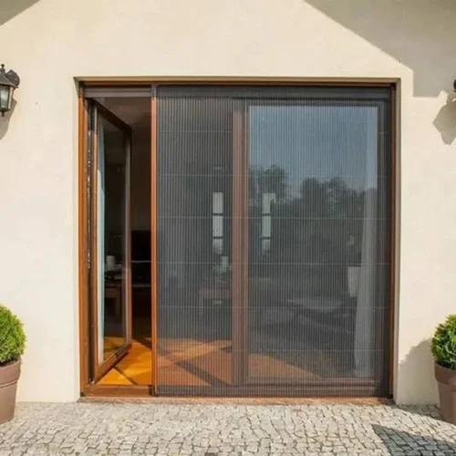 Sliding mosquito net door with fine mesh fitted in a wooden door frame